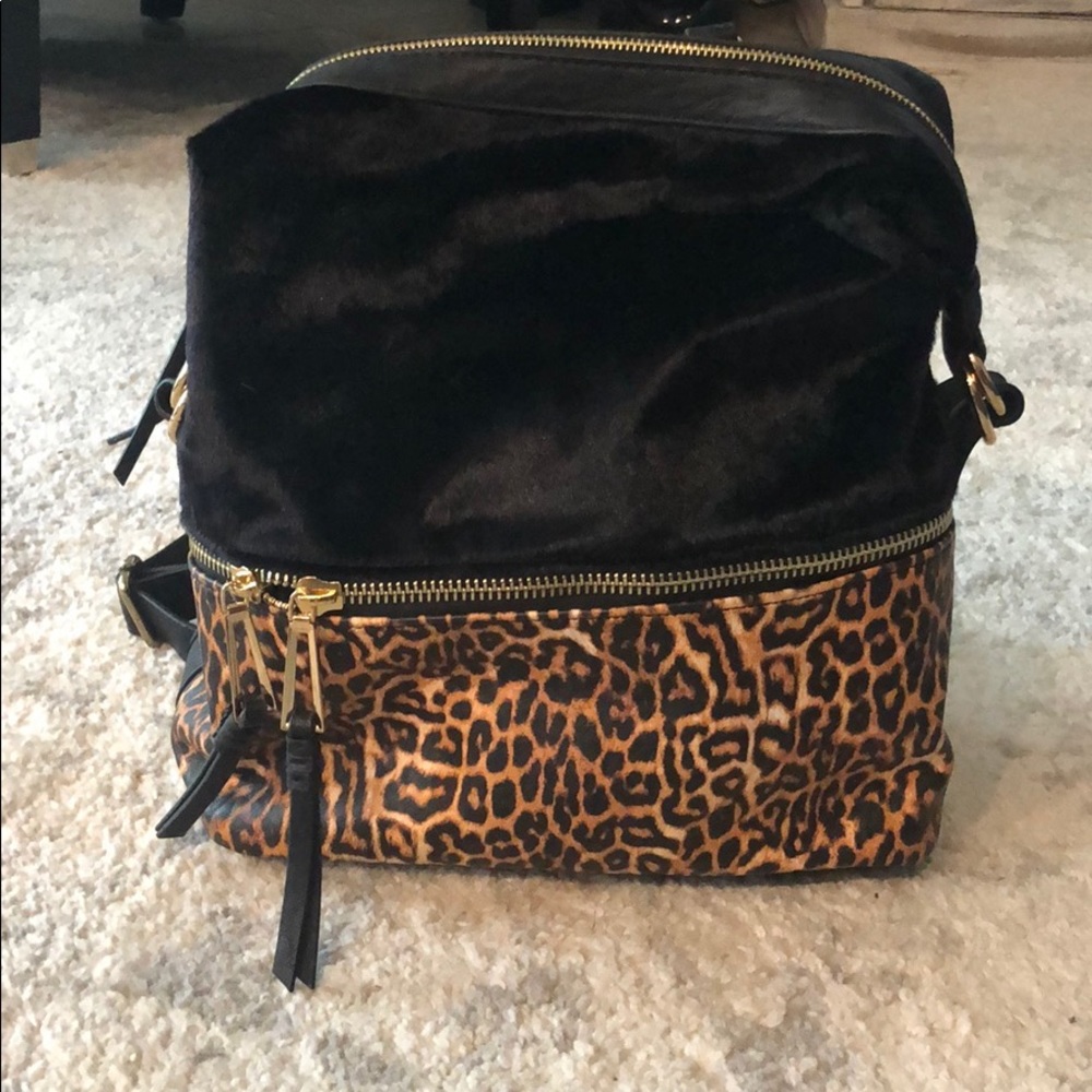 Black leather & Cheetah Flux fur